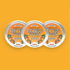 Three tins of Retro Sours Tangerine hard candies.